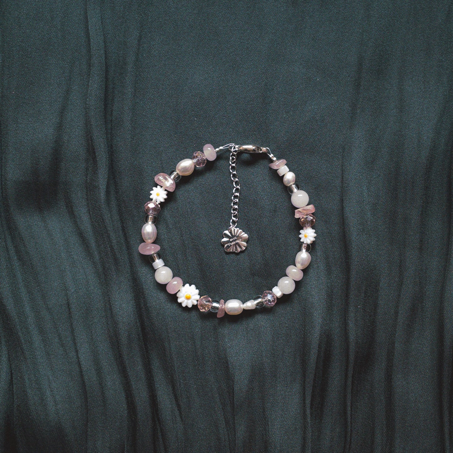 Semi-precious pearl bracelet with pink accent and white flowers