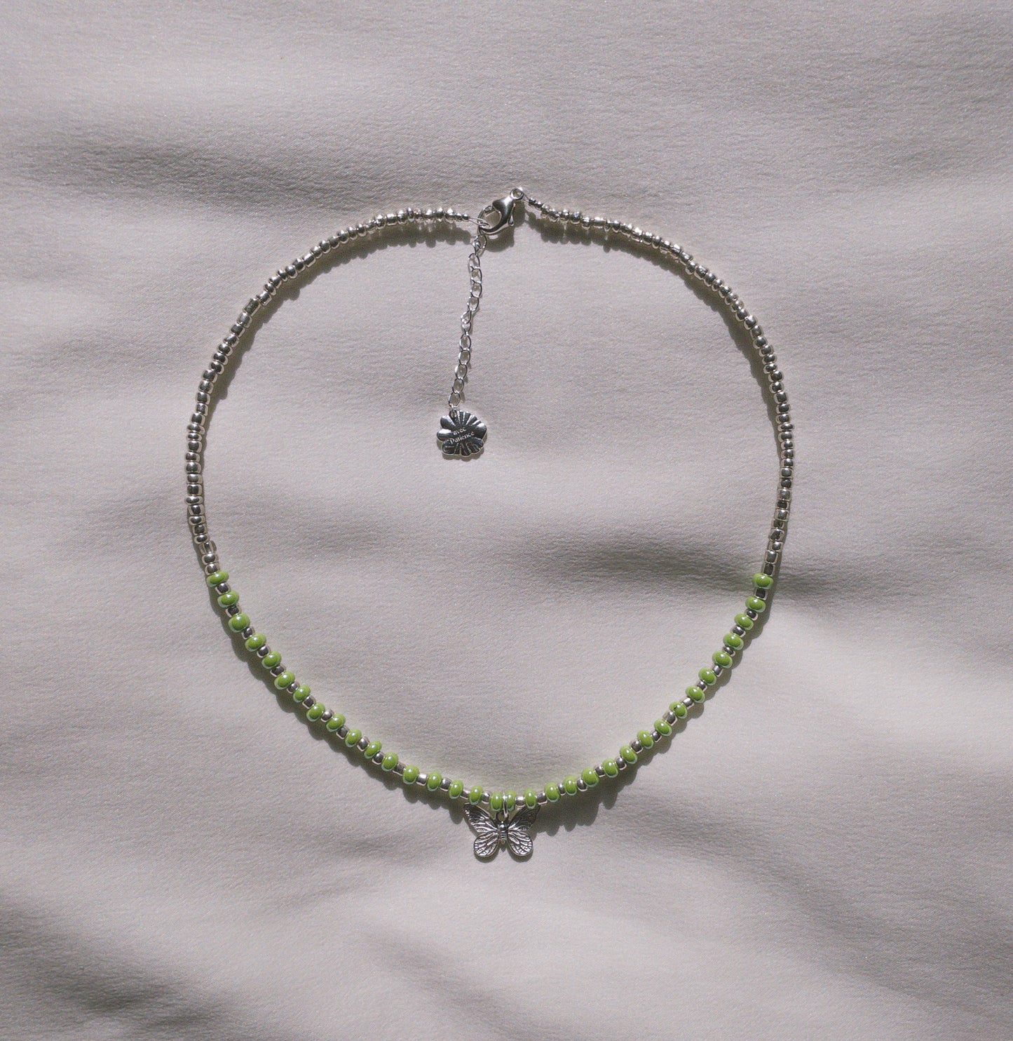 Green and silver necklace with customizable pendants