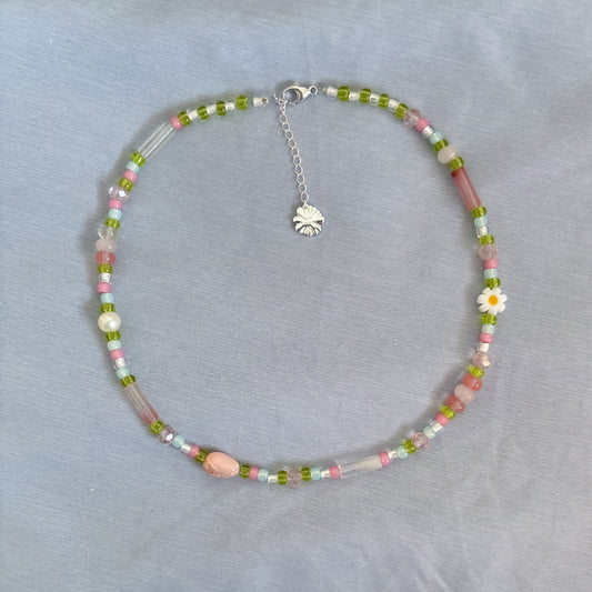 Semi-precious pearl necklace with pink accent and white flowers